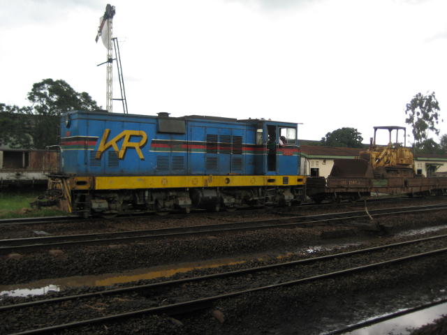 6221 shunts in the rain - photo taken from station platform