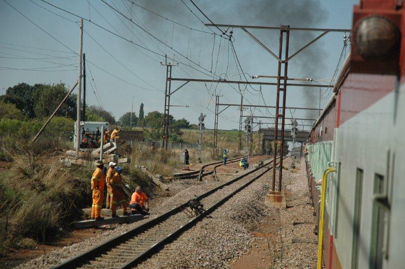 Rationalisation of railway assets. The lifting of unused tracks is now taking place along the line to Witbank. Viewed from the train is the approach to the platform loop line at Rayton, now disconnected and ready for lifting.