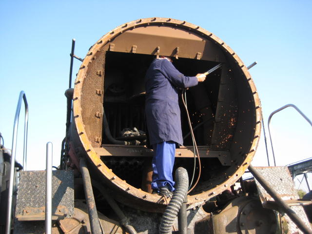 A headless man is cutting up 15CA 2850...