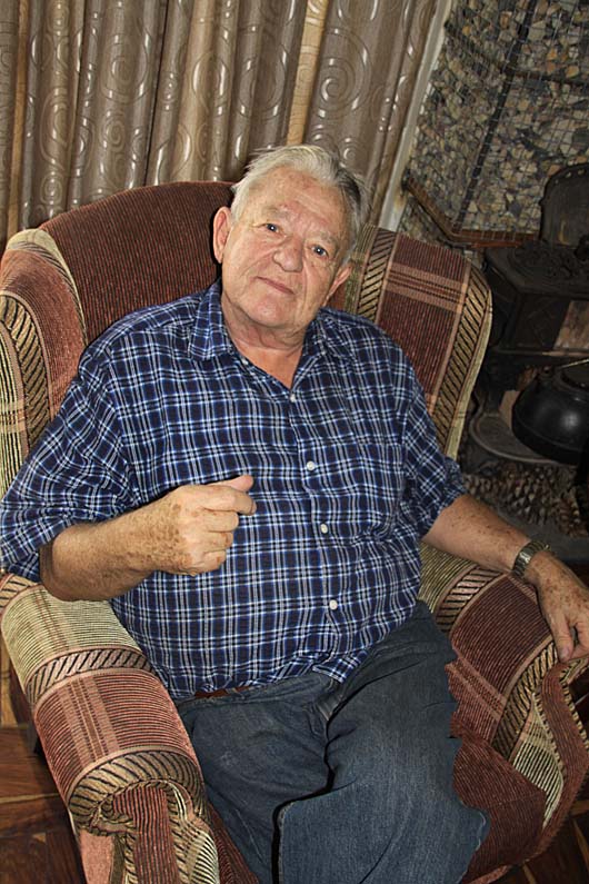 The Lord of the Manor. Billy Victor relaxes in fine style at the Lodge.