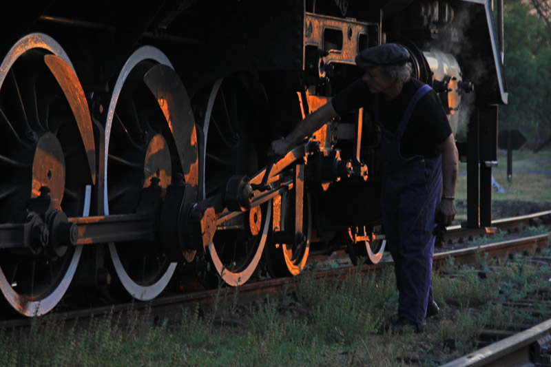 Driver taps and inspects the wheels