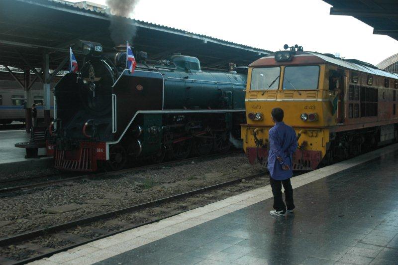 The 40 class diesel departs platform 4 whilst the steamer patiently watches a duty she once shared. 23/10/2010