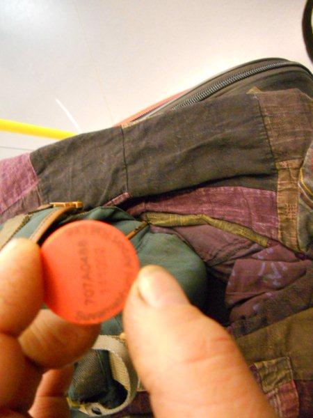 The small disc used for the turnstiles. Sorry about the poor picture quality.