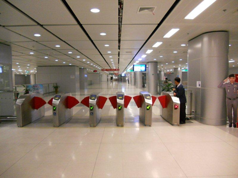 The turnstiles. After picking the destination station, one receives a round disc that gets swiped on an electronic pad at the turnstile and then inserted in the turnstile at the destination, so as to allow one through. Nice and clean with security personel at all stops ready to assist with unfamiliar passengers.