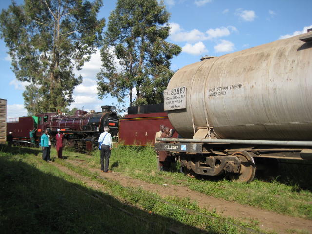 The auxiliary water tank stands in the right foreground, with 3020 to the left and 2409 hidden behind the tank