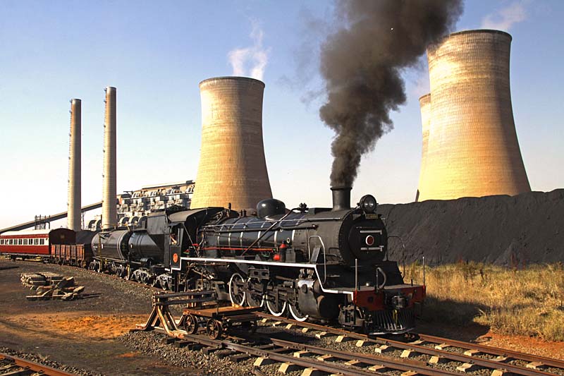 Departing the yard. Note the trolley in foreground