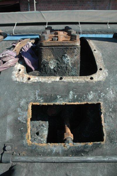 John Dadford has cut away a previously welded smokebox patch, so as to get the blanked off header drain valve sorted out.