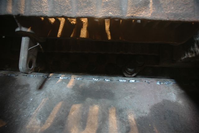 The metal strip welded in place inside the firebox onto the ashpan, will ensure there is no  chance of a live coal exiting and causing a fire risk. This view is taken from under the grates, looking towards the tubeplate, whilst standing in the ashpan!