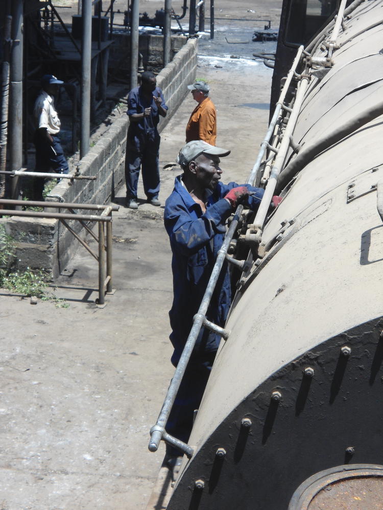 Removing one of the washout plugs...