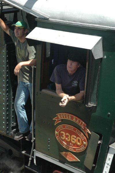 Peter Odell, an ex Beaconsfield driver, and his trainee, Jeff, chat to Gabor who is on the top of the 24 class tender.