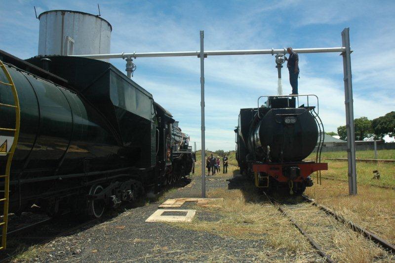 Gabor Kovacs on the class 24 tender, taking water.