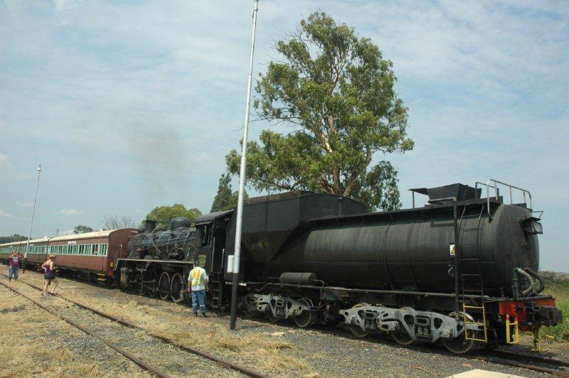 With an earlier operating problem with trackwork at Hercules, the train had to proceed tender first to Cullinan where she is seen here at the water columns