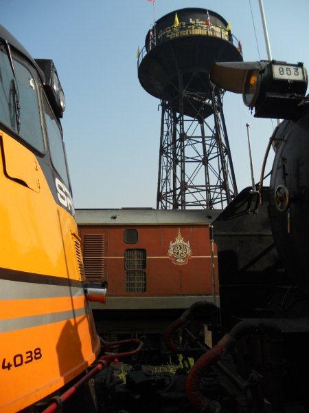 Steam and diesels in two colour schemes stand at the Bangkok Thonburri depot. The steam has all been currently withdrawn due to boiler problems