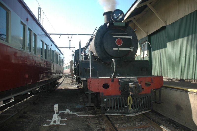 3664, the class 24, has set back to the signal with her train to Cullinan and just waits for the correct aspect before proceeding to Hercules station.