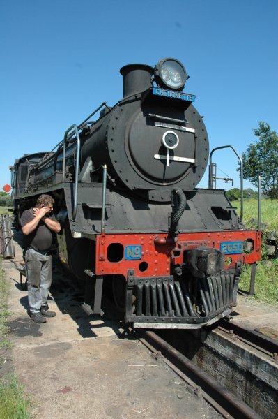 The 19D stands on the pit for repairs after the derailment. Gabor discusses with Robert Dadford over the phone what repairs have been completed so far.