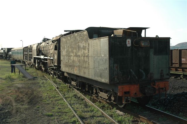 Its December 2006 and 15F 3117 has had some work done to her and now the<br />time is right for moving her onto the inspection pit and then splitting the tender from the loco. Up front, the FOTR class 24 pushes her in.