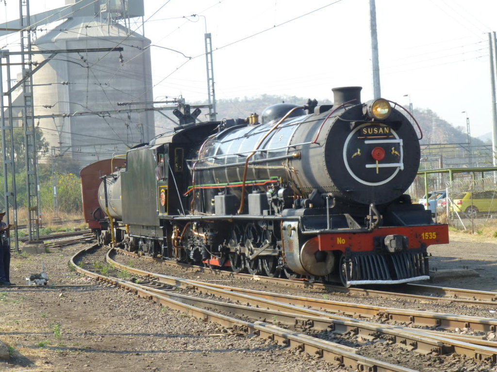 The signal has cleared and the train sets back out of Hercules yard into Hercules Station.