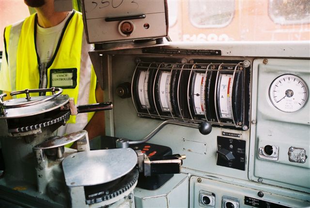 From the driver's side looking towards the assistant's side. The brake and driving power levers.