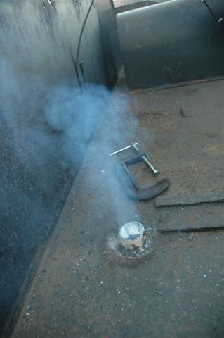On top of the 15F tender, the view here is where the vacuum reservoir will be mounted. Welding fumes are seen emiting from the newly fitted galvanised piping, which runs through the water space of the tender. Inside this pipe will be the smaller vacuum pipe from the reservoir which will then surface below the tender frame.