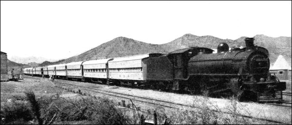 DESOLATE COUNTRY of the nature seen above is traversed by the Sudan Railway expresses. In some districts penetrated by the railway the total annual fall of rain is negligible-only four or five hours during the whole year.