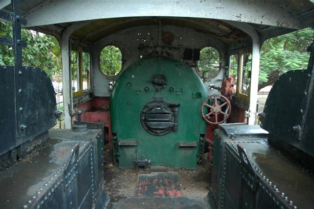View from inside tender of woodburner Thai railways loco plinthed at Chaing Mai. I opened the firehole door and saw just a plain set of firebars and no brick arch.