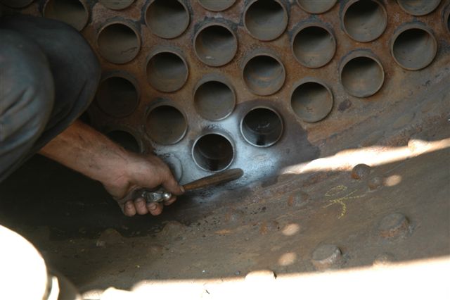 Suspect area of tube in smokebox end of 15F 3117. The white area is the ultrasonic treated portion of the tubeplate which will show up any flaws, cracks etc.<br /><br />Photo by Nathan Berelowitz 29/09/07