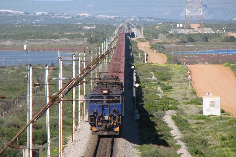 9E 9003 leads a pack of Diesels off the Loop on to the Main Line