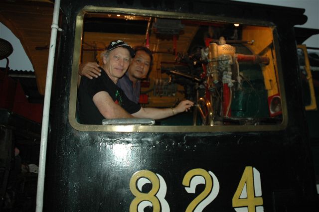 Nathan and Nippon in the cab of the pacific at Bangkok station on the day of the special. October 23rd 2009