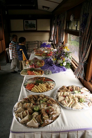 A feast laid out in the Regional Manager's Saloon
