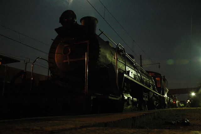 3664 class 24 at Pyramid. Time 01:30 in the year 2010. New year's train awaiting to return home.